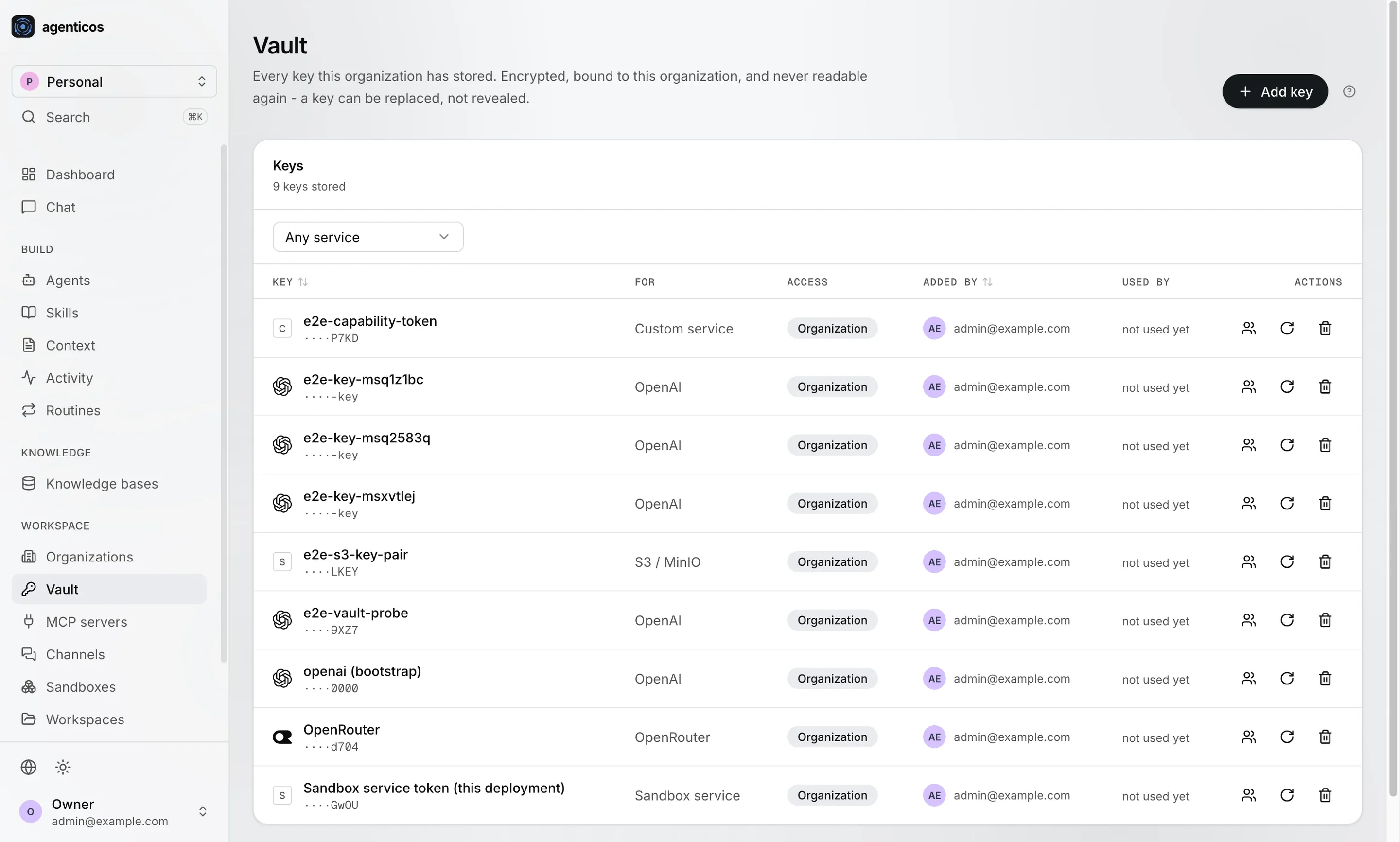 Vault listing stored keys by service, access level and who added them; values are not shown.